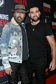 nicolas cage gets support son weston at running with the devil premiere 04