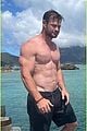 chris hemsworth bares ripped abs on vacation 03
