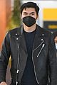 henry golding masks up for flight into nyc 02