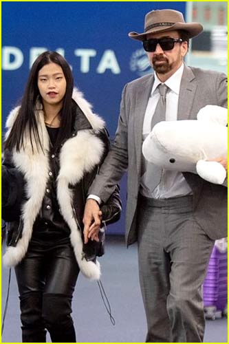 Nicolas Cage and Riko Shibata at airport