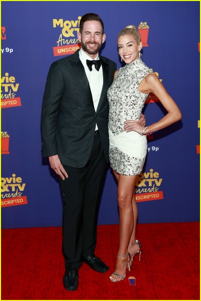 Tarek El Moussa and Heather Rae Young on red carpet at the MTV Movie and TV Awards Unscripted