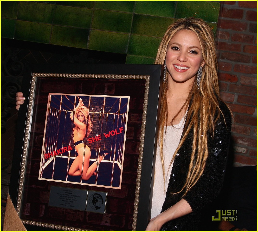 Shakira shows off her dreadlocks as she attends the Rolling Stone cover and...
