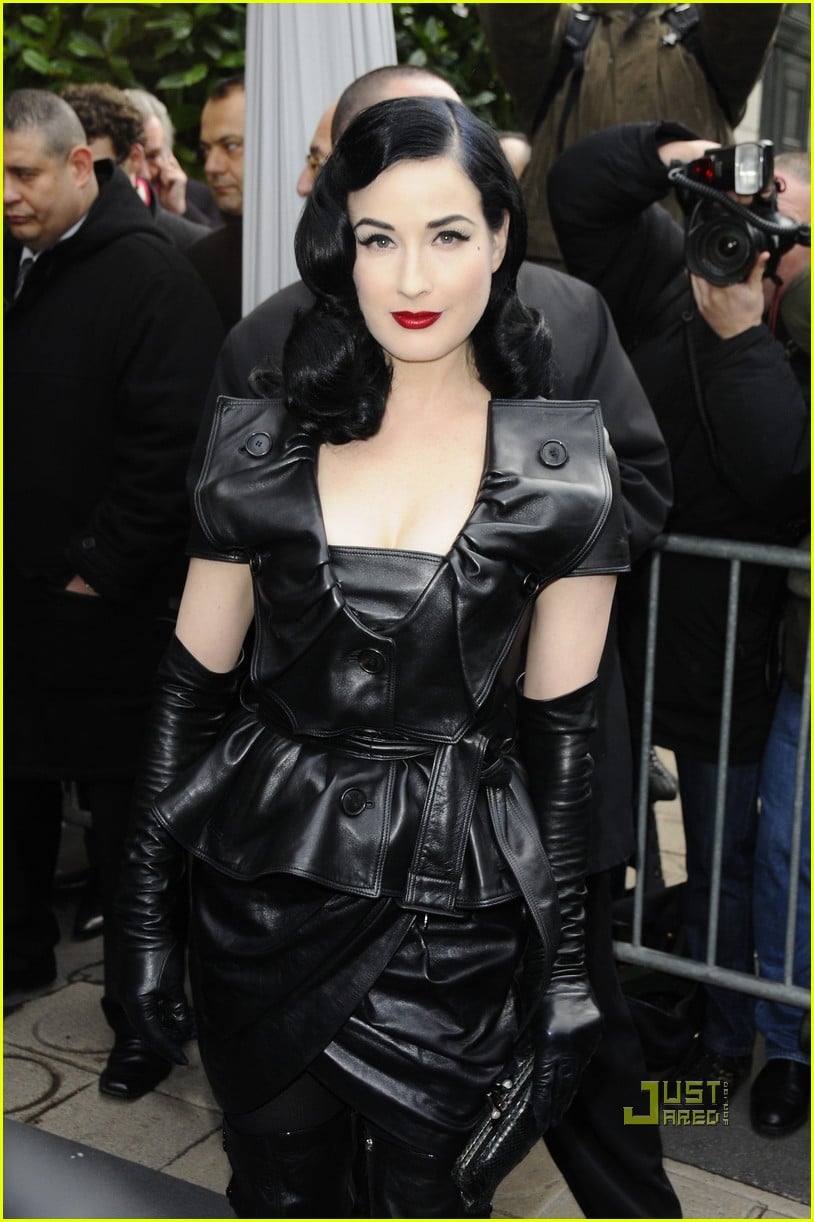 Dita Von Teese steps out of her car and heads into the Christian Dior haute...