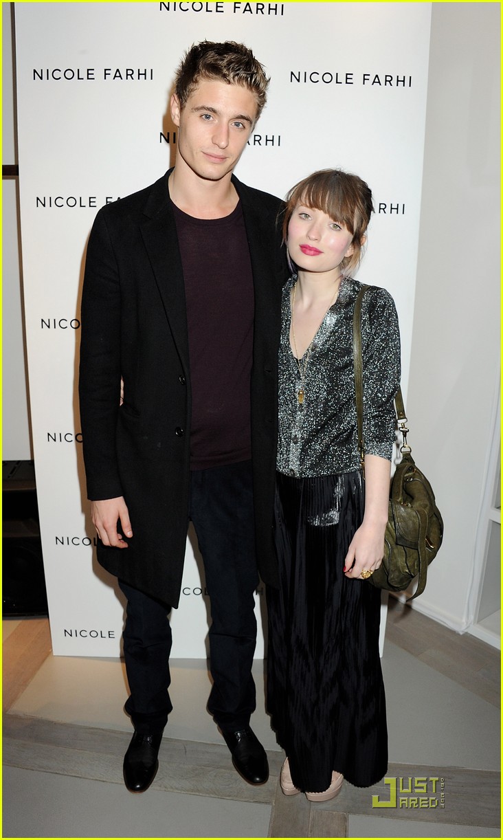 Emily Browning and her boyfriend Max Irons smile for the camera at the open...