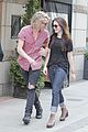 lily collins jamie campbell bower hold hands toronto 01