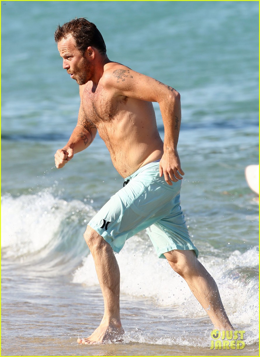 Stephen Dorff shows off his shirtless physique as he walks out of the ocean...