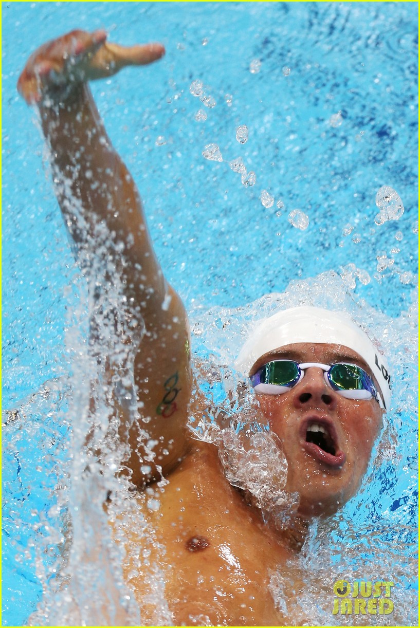 Ryan Lochte American Flag Grill at London Olympic Games! Photo