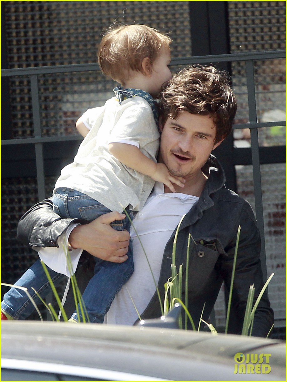 Orlando Bloom Shirtless Clothes Fitting With Flynn Photo 2860280