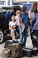 jennifer connelly paul bettany lax arrivial with the kids 01