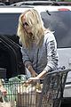 malin akerman shops after juvenile camp visit 02
