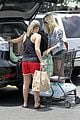 malin akerman shops after juvenile camp visit 04