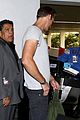 Alexander Skarsgard Flaunts Buff Biceps at LAX Security 