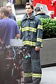 matt bomer fire fighter on white collar set 07
