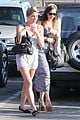 ashley greene shows white bra with overalls 08