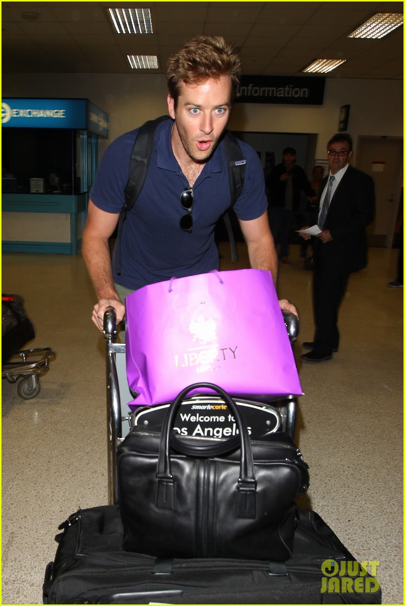 Armie Hammer & Elizabeth Chambers Post BDay LAX Arrival! Photo