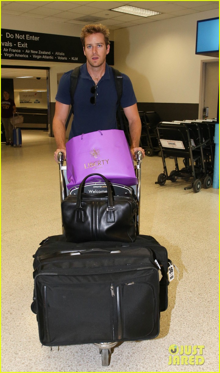 Armie Hammer & Elizabeth Chambers Post BDay LAX Arrival! Photo