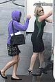 amy poehler playfully kisses aubrey plaza on parks rec set 03