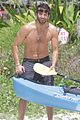 bradley cooper shirtless at the beach with suki waterhouse 01