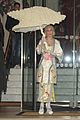lady gaga carries large seashell umbrella around london 01