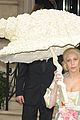 lady gaga carries large seashell umbrella around london 02