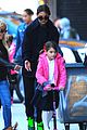 katie holmes helps suri scooter in nyc 01