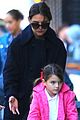 katie holmes helps suri scooter in nyc 04