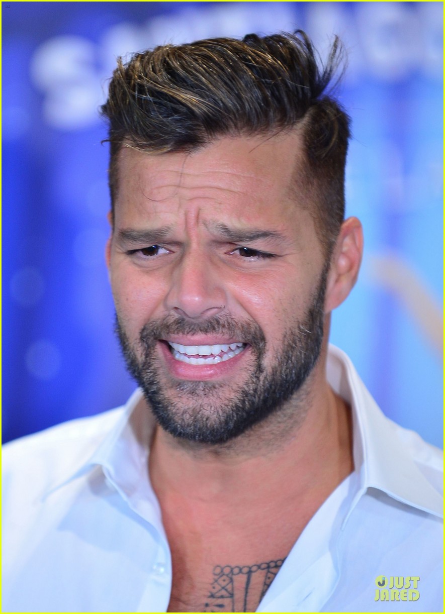 Full Sized Photo of ricky martin flashes chest hair for santiago signing 14...