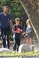 chris martin stroll with kids after kanye west concert 13