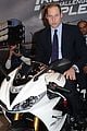 prince william receives gift at motorcycle live show 02