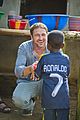 gerard butler visits liberia with marys meals all the photos 86