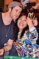 chris hemsworth carries thor hammer at narita airport 02