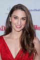 sara bareilles puts on her little red dress for womans day 02