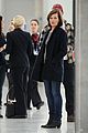 milla jovovich survivor cuts at heathrow airport 03