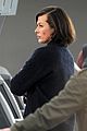 milla jovovich survivor cuts at heathrow airport 10
