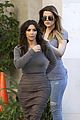 kim kardashian goes back to brunette hair steps out with sisters khloe kylie with new do 08