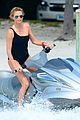 charlize therons bathing suit body is so enviable during jet ski shoot 01