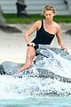 charlize therons bathing suit body is so enviable during jet ski shoot 06
