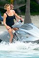 charlize therons bathing suit body is so enviable during jet ski shoot 10
