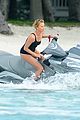 charlize therons bathing suit body is so enviable during jet ski shoot 12