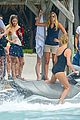 charlize therons bathing suit body is so enviable during jet ski shoot 15