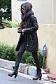 selena gomez bundles up on a rare rainy day in los angeles 03