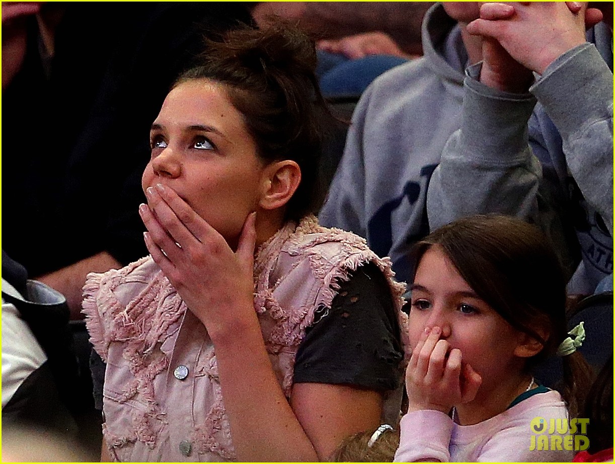 Katie Holmes Makes Rare Appearance with Suri at NCAA Game! Photo