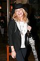 leann rimes fights rain storm with umbrella at tosconova restaurant 02