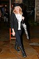 leann rimes fights rain storm with umbrella at tosconova restaurant 05