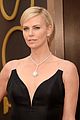 charlize theron stuns in dior on oscars 2014 red carpet 01