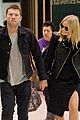 sam worthington lara bingle sydney airport departure 02