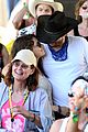 mila kunis reveals small baby bump in belly shirt packs on pda with ashton kutcher 04