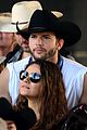 mila kunis reveals small baby bump in belly shirt packs on pda with ashton kutcher 05