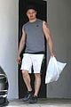 jeremy renner bulging biceps superhero workout 03
