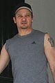 jeremy renner bulging biceps superhero workout 04